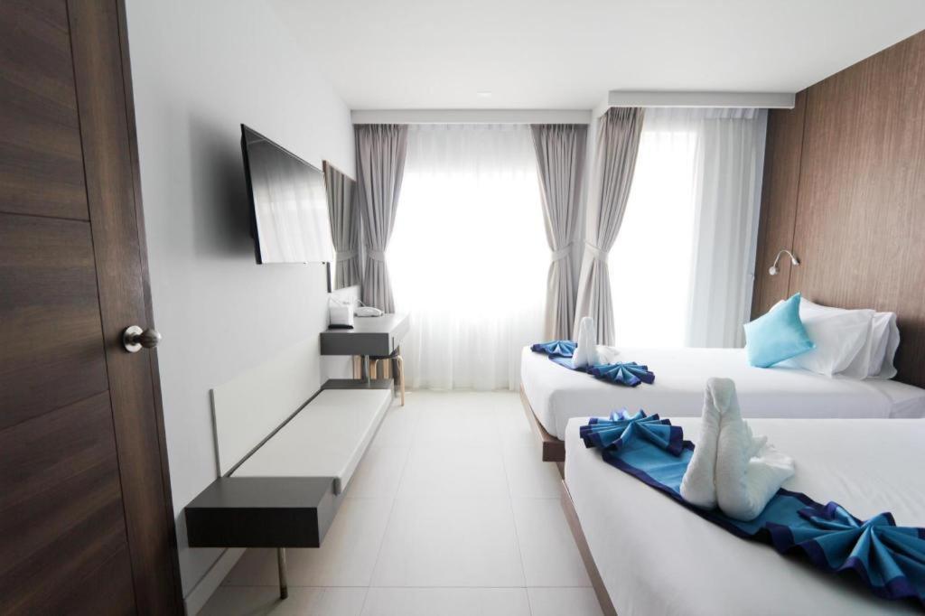 Elegancy Sansabai Hotel Patong Extérieur photo