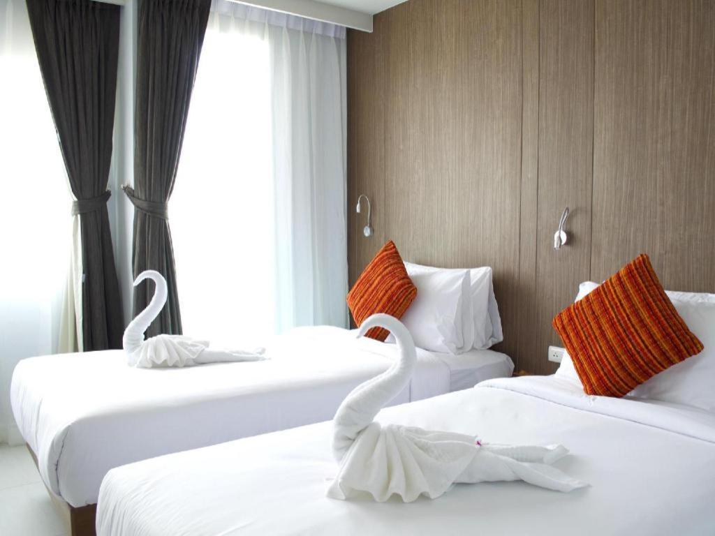 Elegancy Sansabai Hotel Patong Extérieur photo